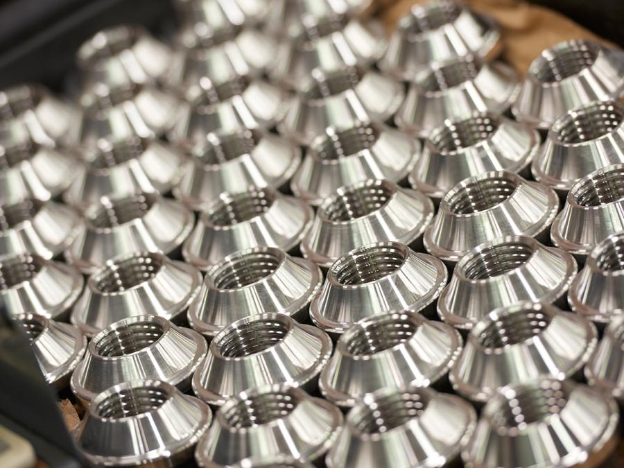 close up of industrial nuts for precision manufacturing